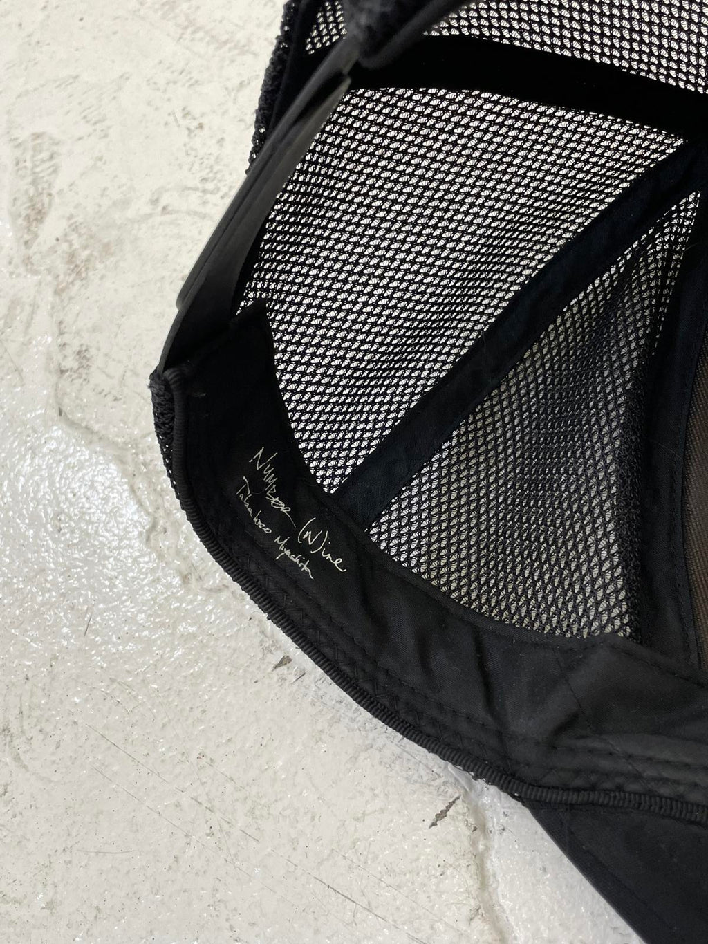 Number (N)ine Aw04 black tribal trucker hat