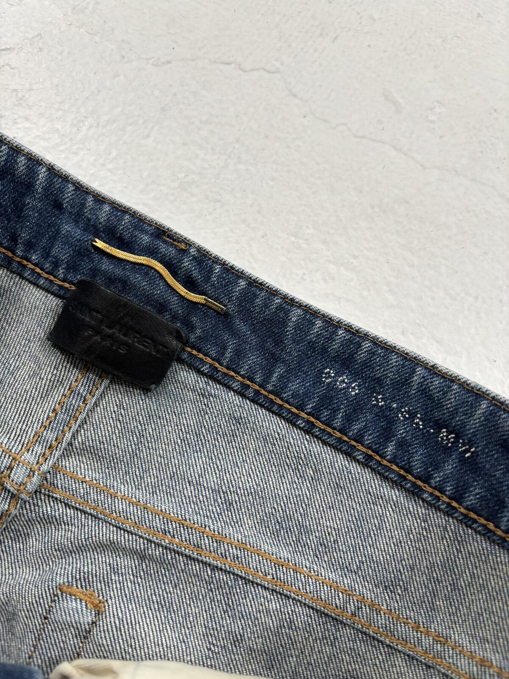 Saint Laurent D06 Light wash denim {{ color }} {{ brand }} {{ archive }} {{ season }} {{ year }} {{ hedi slimane }}