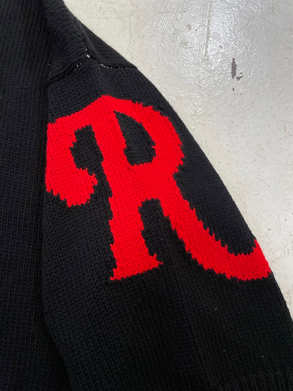 Raf Simon’s oversized Sweater