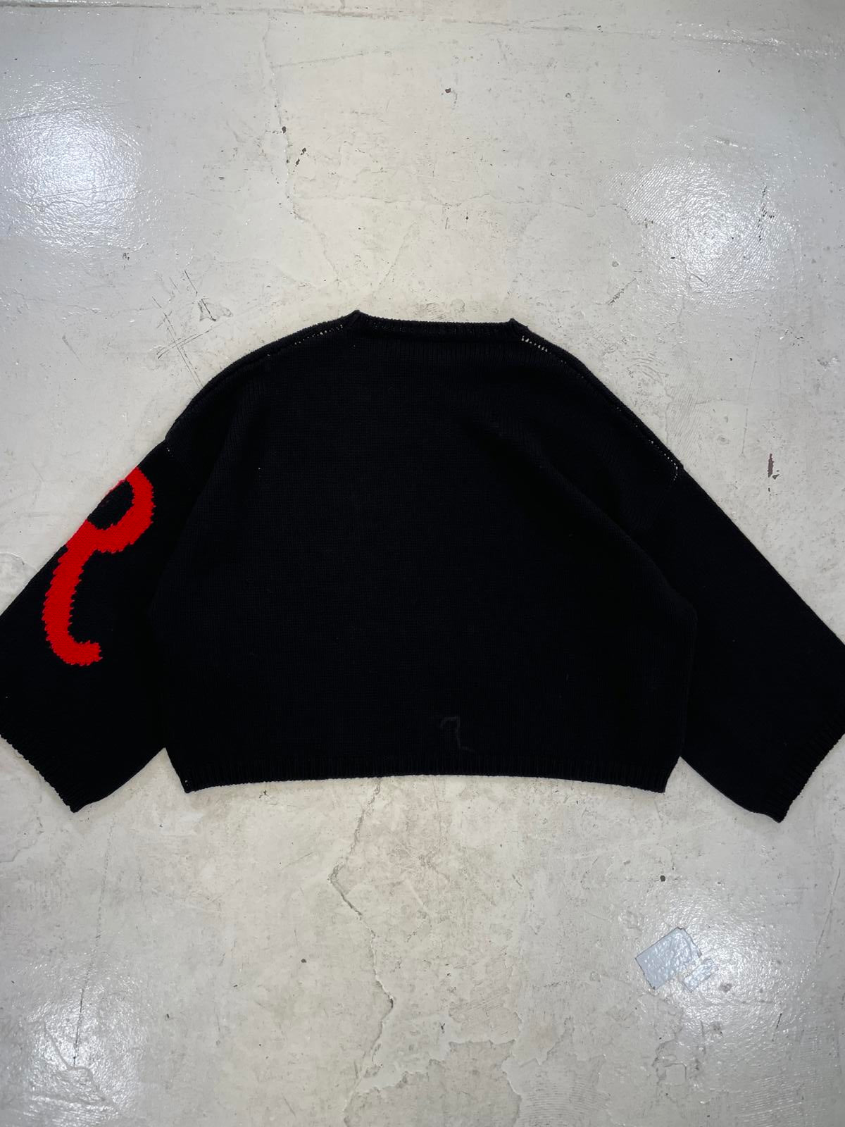Raf Simon’s oversized Sweater