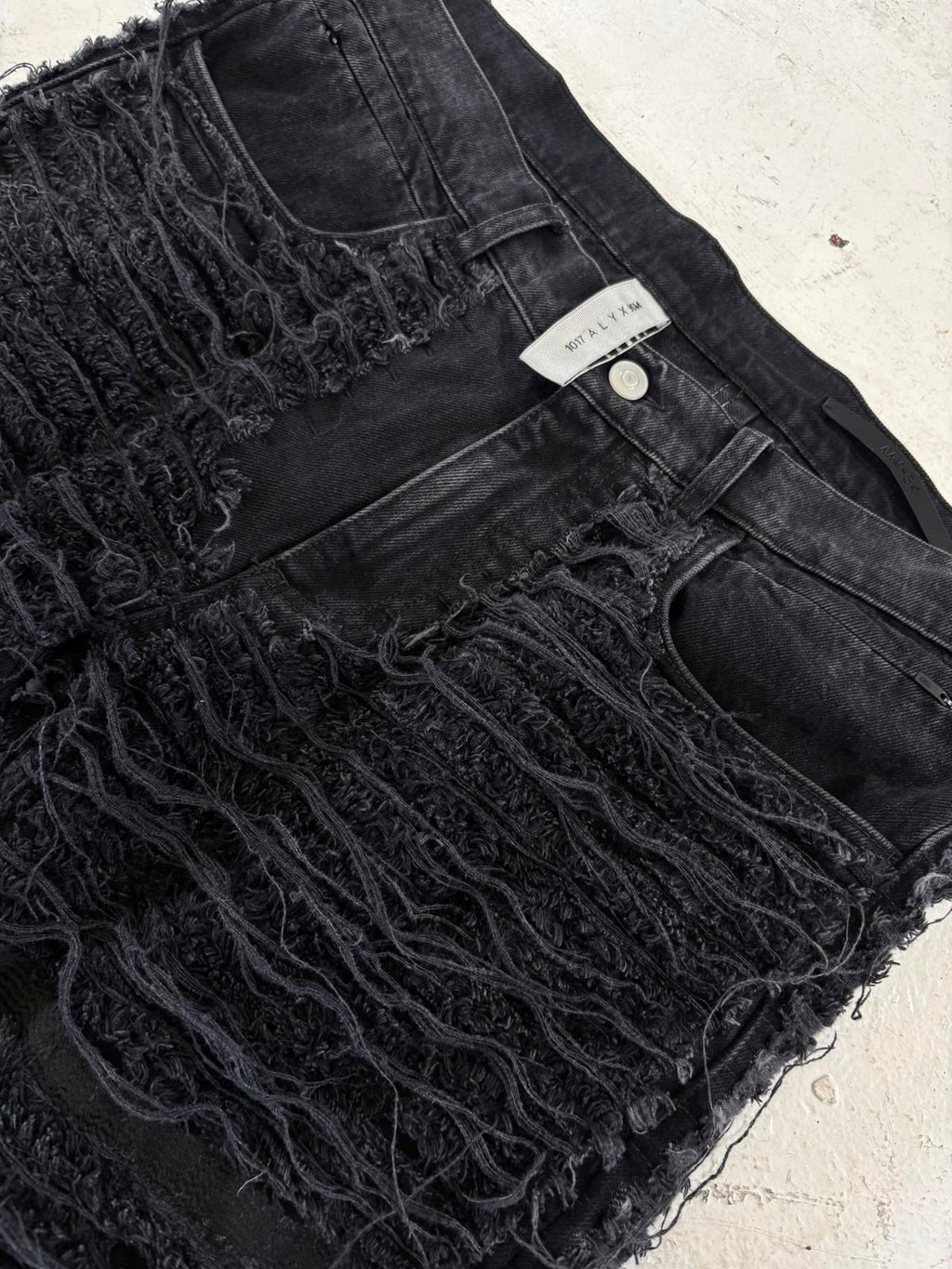 1017 Alyx x BlackMeans distressed denim