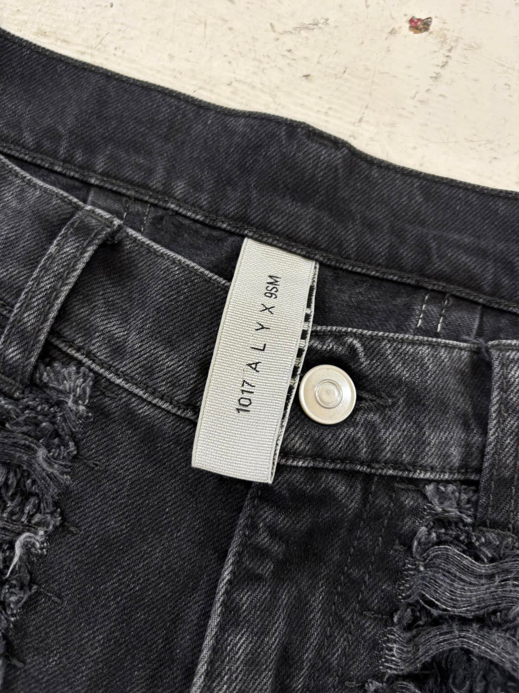 1017 Alyx x BlackMeans distressed denim