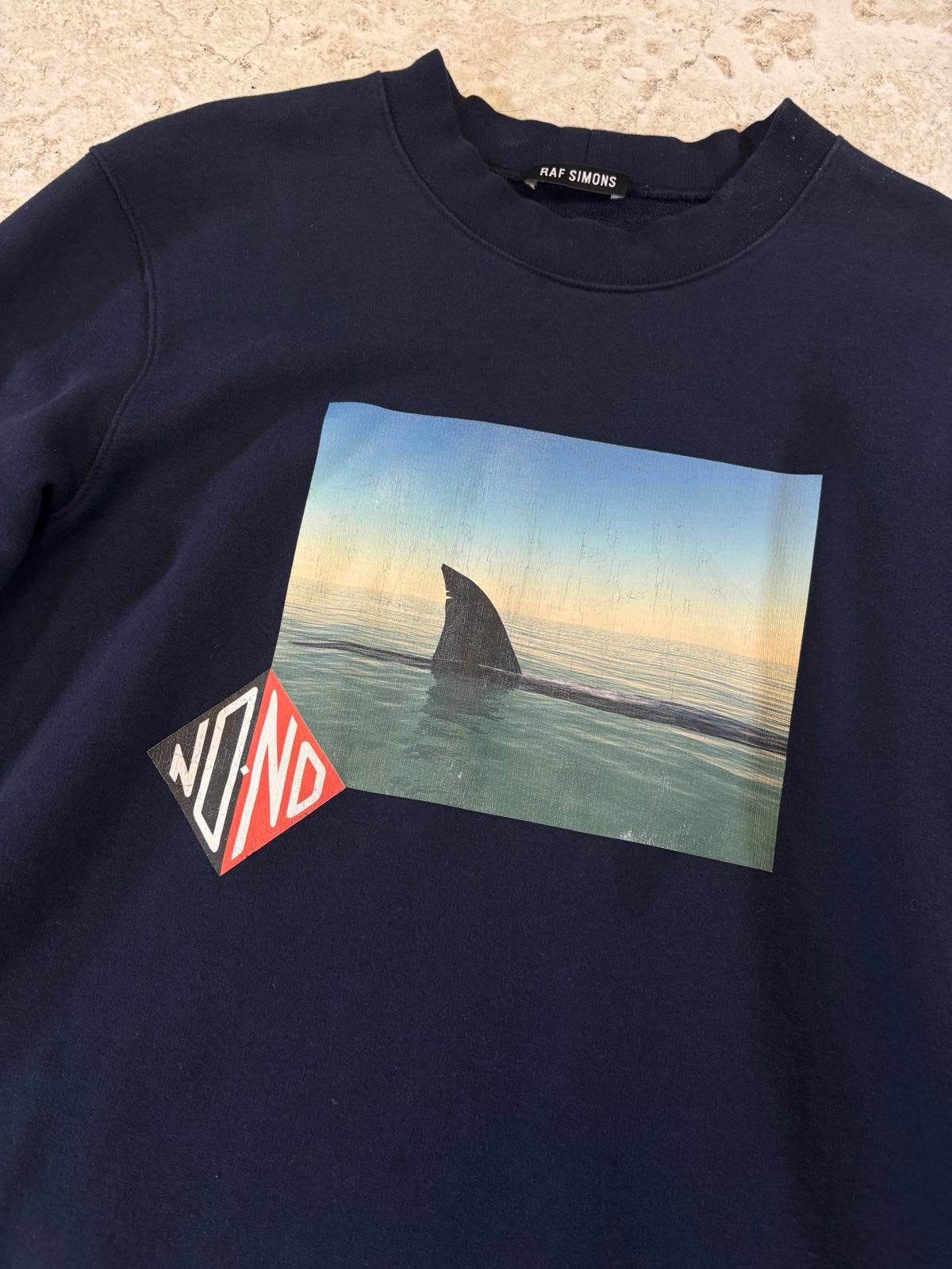 Raf Simon’s Shark Crewneck