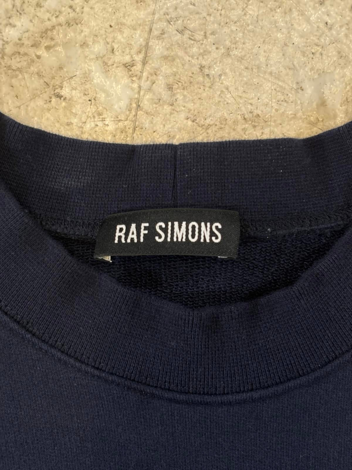 Raf Simon’s Shark Crewneck