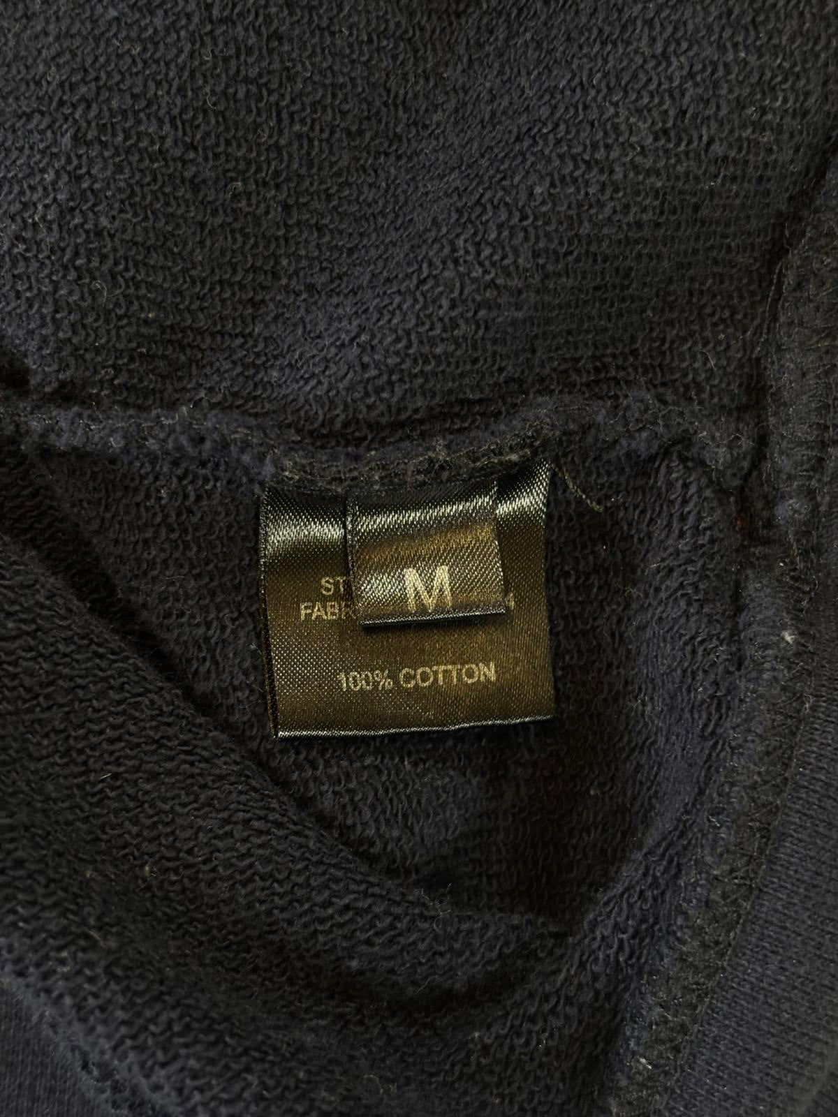 Raf Simon’s Shark Crewneck