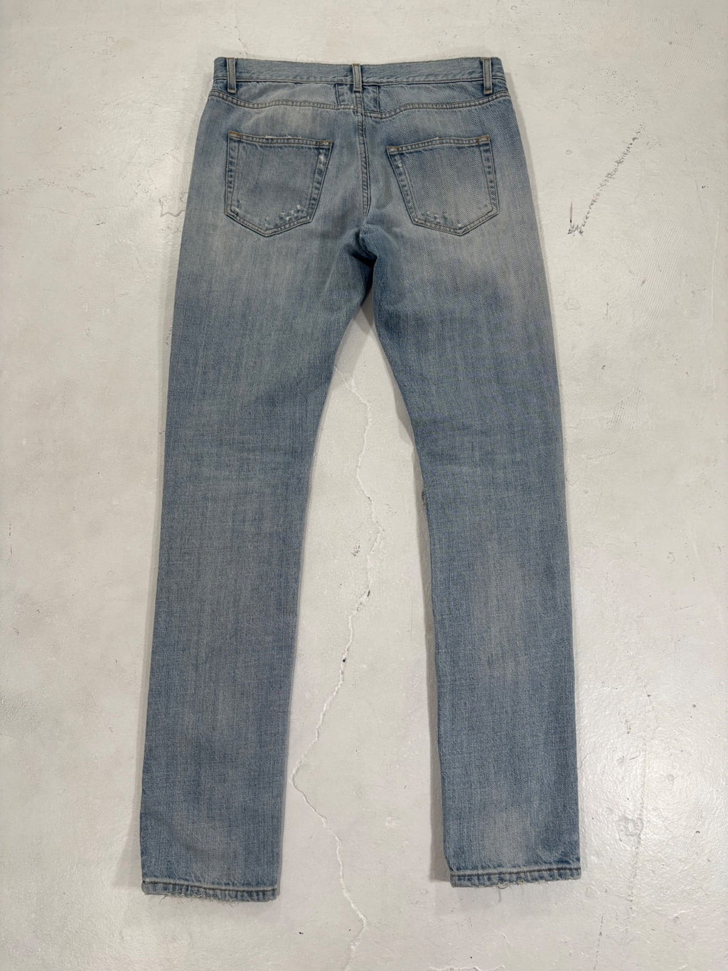Saint Laurent Paris Light Blue Repaired Denim {{ color }} {{ brand }} {{ archive }} {{ season }} {{ year }} {{ hedi slimane }}