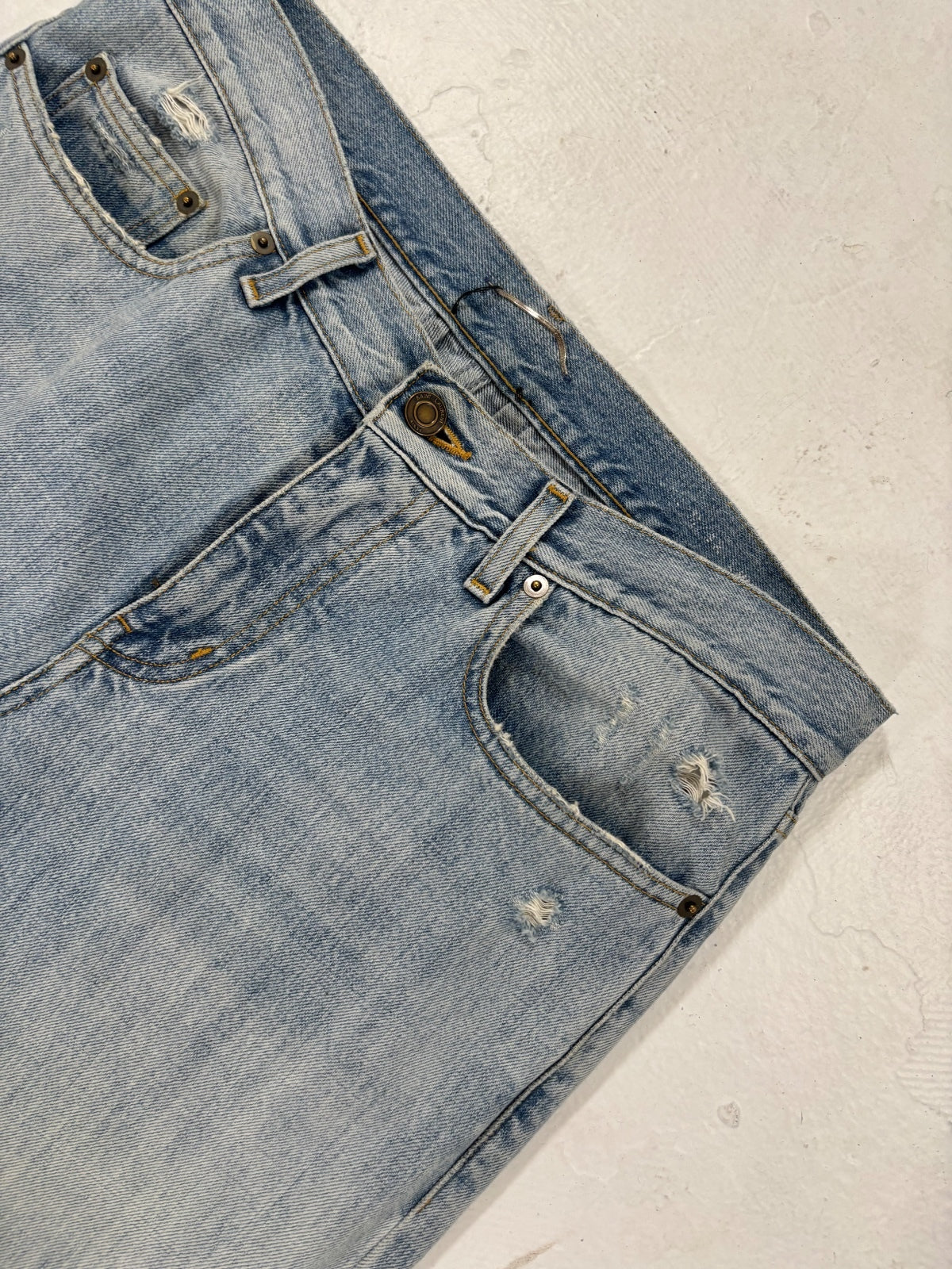 Saint Laurent Paris Light Blue Repaired Denim {{ color }} {{ brand }} {{ archive }} {{ season }} {{ year }} {{ hedi slimane }}